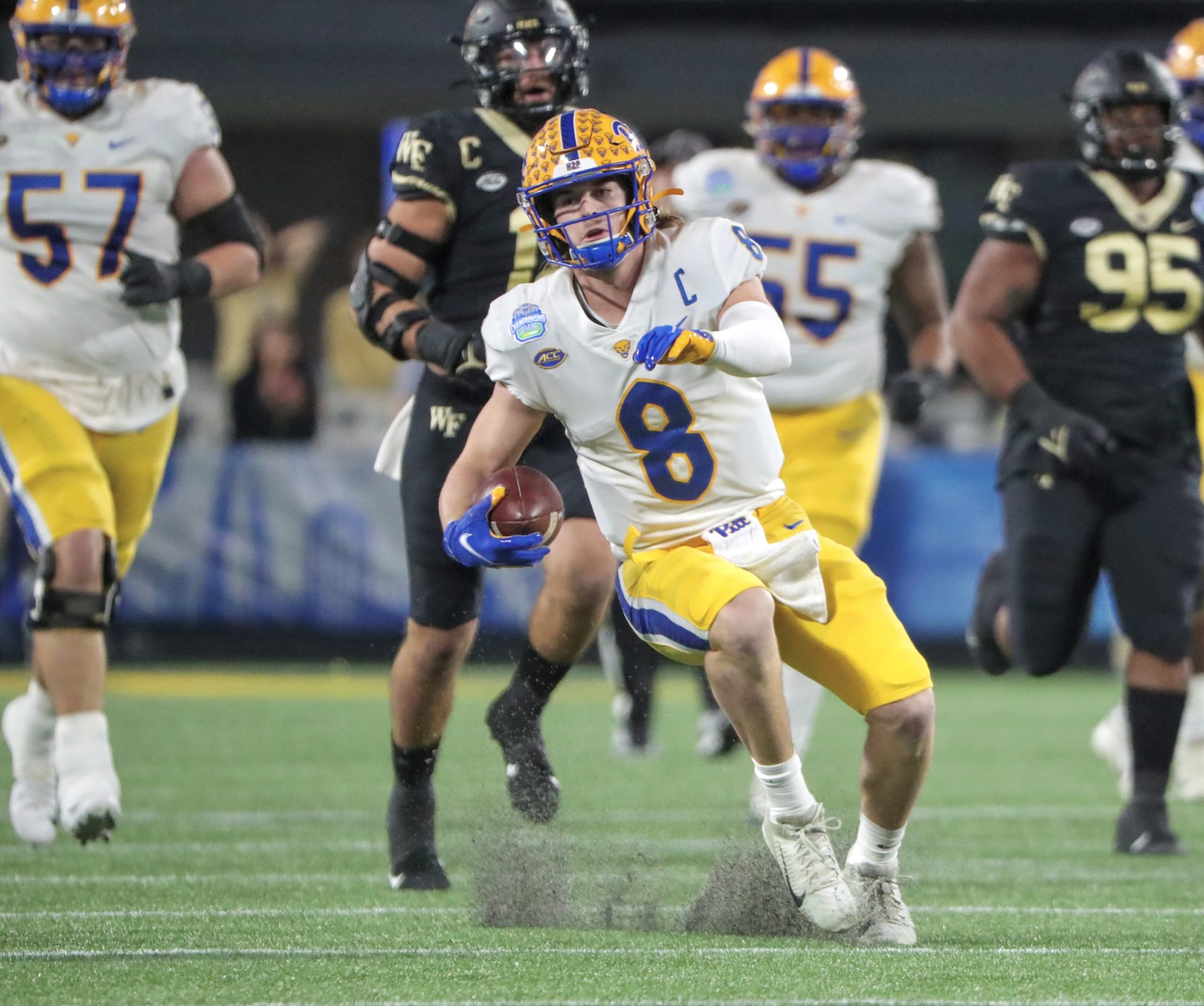 Pittsburgh quarterback Kenny Pickett (8) celebrates with head coach Pat  Narduzzi after scoring a touchdown in the second half of an NCAA college  football game, Friday, Nov. 24, 2017, in Pittsburgh. Pittsburgh