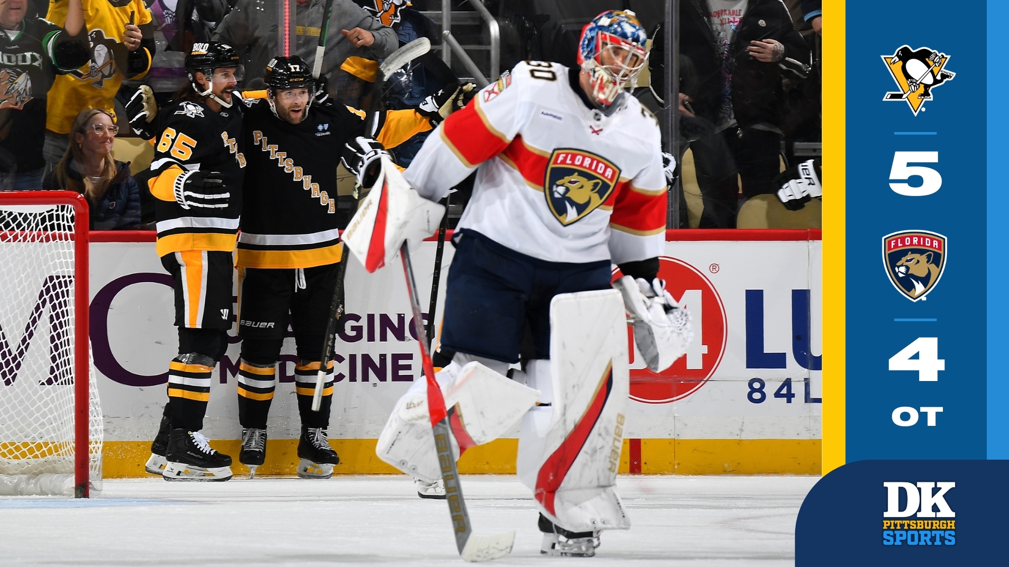 Erik Karlsson and Bryan Rust celebrate the latter's overtime goal as the Panthers' Spencer Knight skates off Tuesday night at PPG Paints Arena.