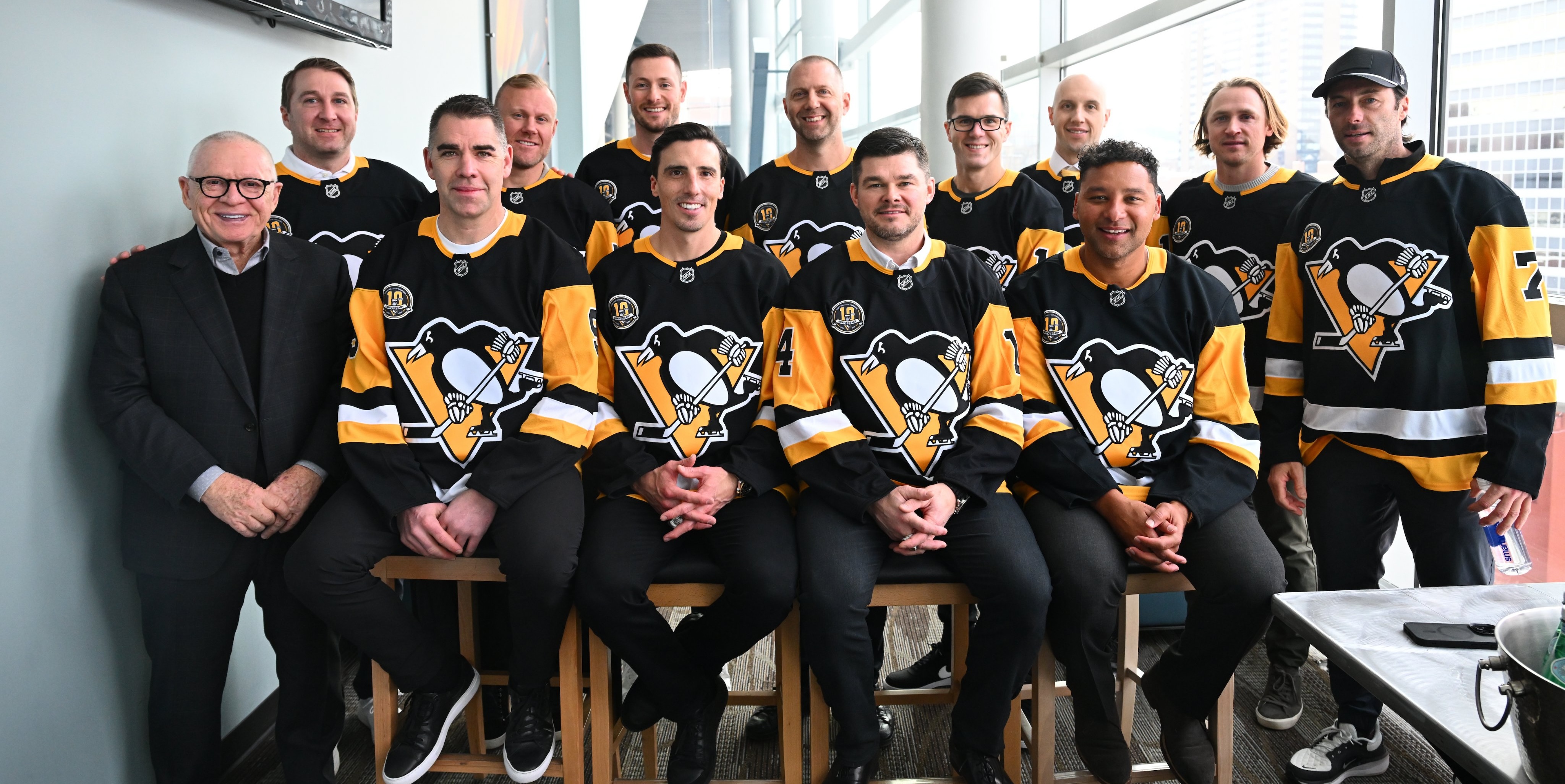 Top row: Jeff Zatkoff, Patric Hornqvist, Tom Kuhnhackl, Eric Fehr, Ben Lovejoy, Nick Bonino, Carl Hagelin, Matt Cullen. Bottom row: Jim Rutherford, Pascal Dupuis, Marc-Andre Fleury, Chris Kunitz, Trevor Daley