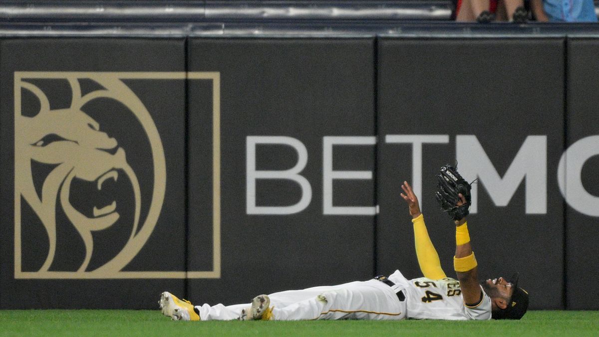 Josh Palacios celebrates his game-ending catch Monday night at PNC Park.