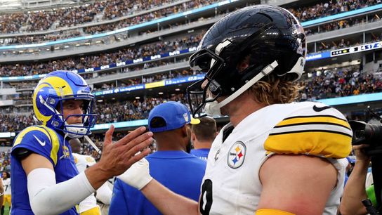 Kenny Pickett shakes hands with the Rams' Matthew Stafford.