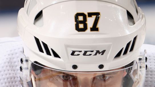 Sidney Crosby lines up for a faceoff Wednesday night in Elmont, N.Y.