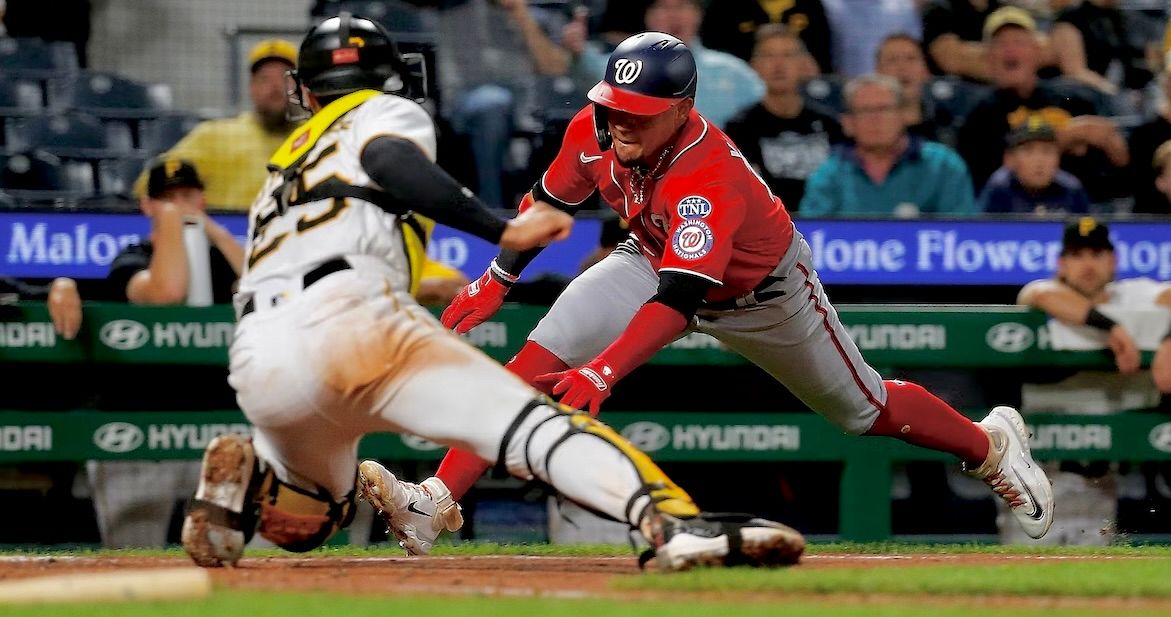 The Nationals' Ildemaro Vargas is tagged out by Endy Rodriguez in the seventh inning Tuesday night at PNC Park.