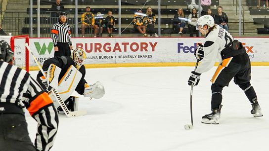 Ville Koivunen takes a shot on Alex Nedeljkovic in a shootout in training camp in Cranberry, Pa. on Wednesday