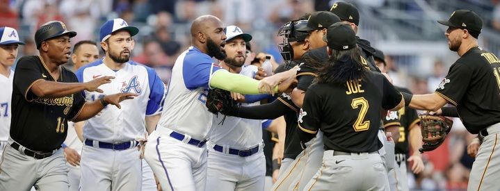 Marcell Ozuna of the Braves and Johan Oviedo jaw during a first inning benches clearing incident Saturday at Truist Park.