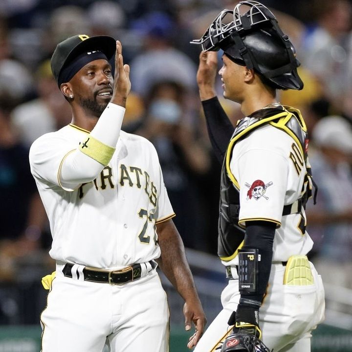 Andrew McCutchen and Endy Rodriguez high five after the Pirates' win at PNC Park Saturday.