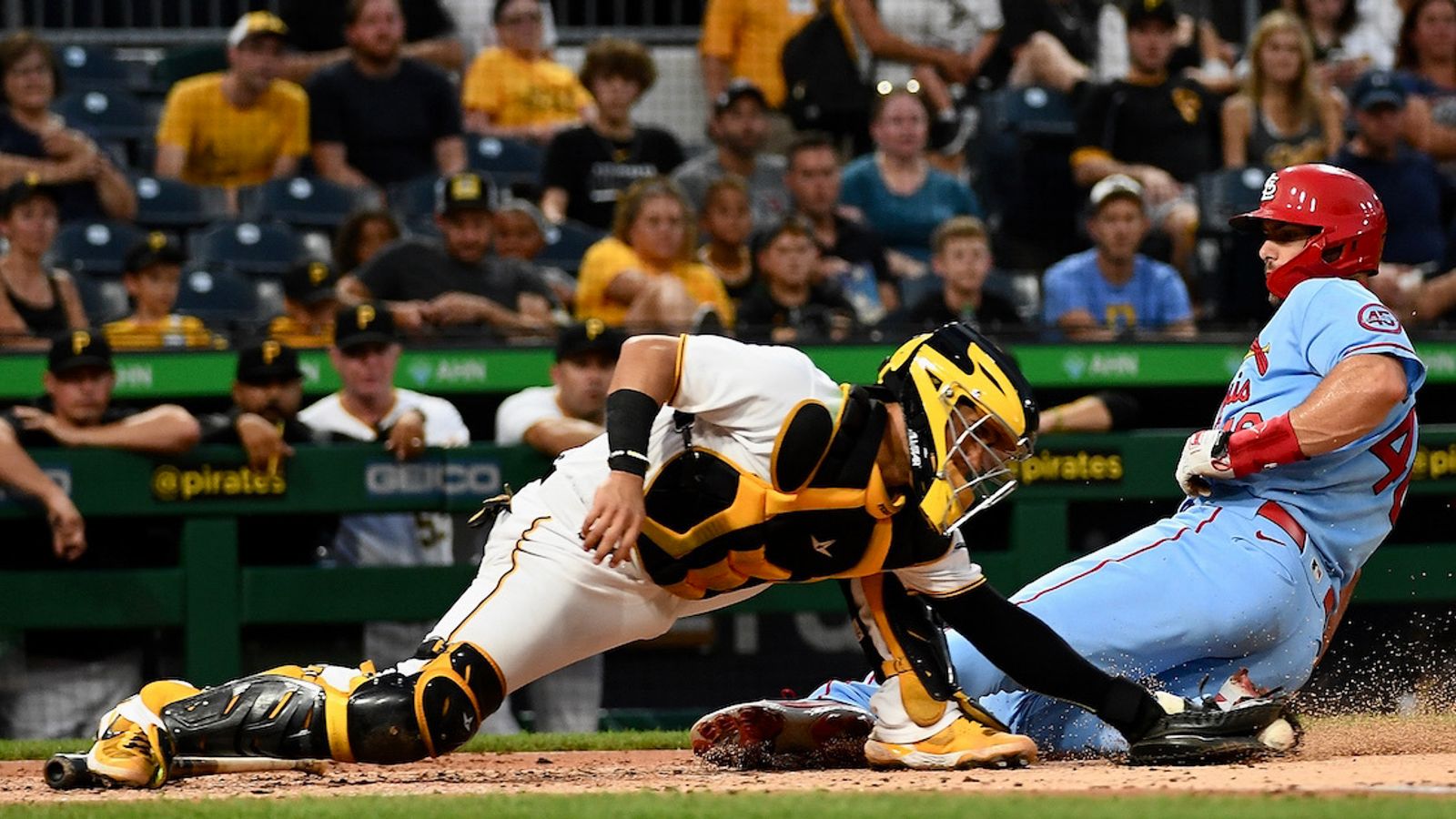 Yadier Molina is very excited after throwing out Gregory Polanco at second  base