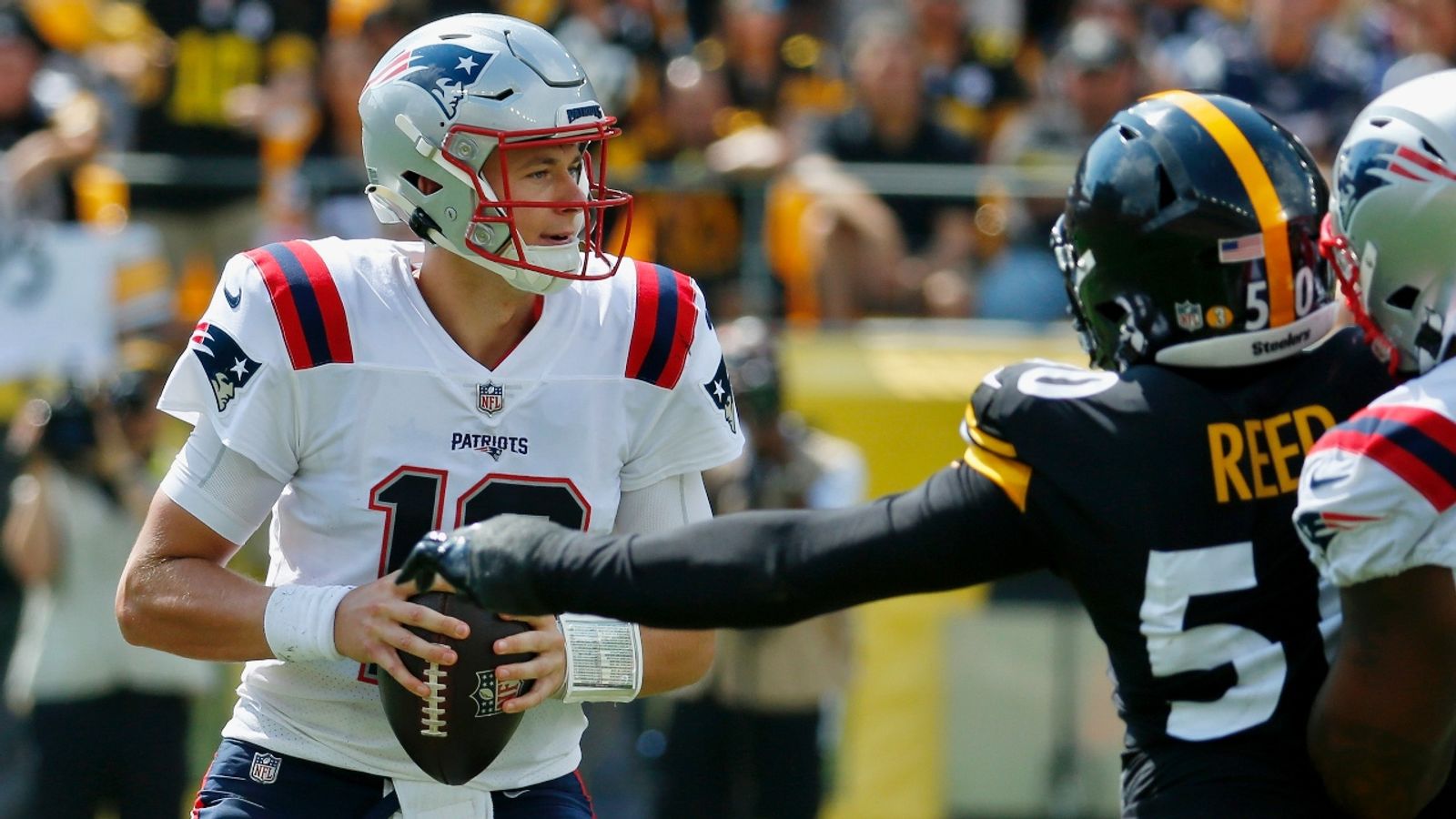 New England Patriots quarterback Tom Brady (12) passes under pressure from  Pittsburgh Steelers defensive end Cameron Heyward, right, during the second  half of an NFL football game in Pittsburgh, S …