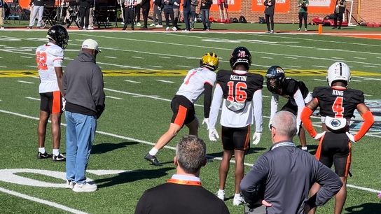 MIke Tomlin, left, watches as Michigan receiver Roman Wilson lines up against Toledo cornerback Quinyon Mitchell during practice at the Senior Bowl Jan. 31 in Mobile, Ala.