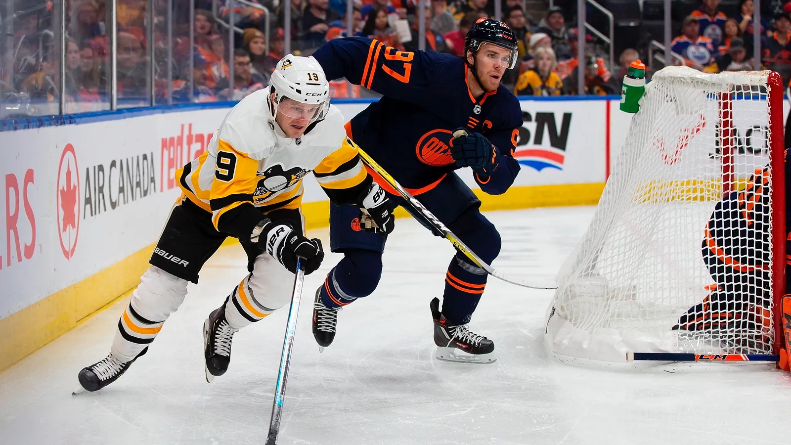 Disciplined Penguins race by McDavid, Oilers ... yet again ☕ taken in Edmonton, Alberta (Penguins)