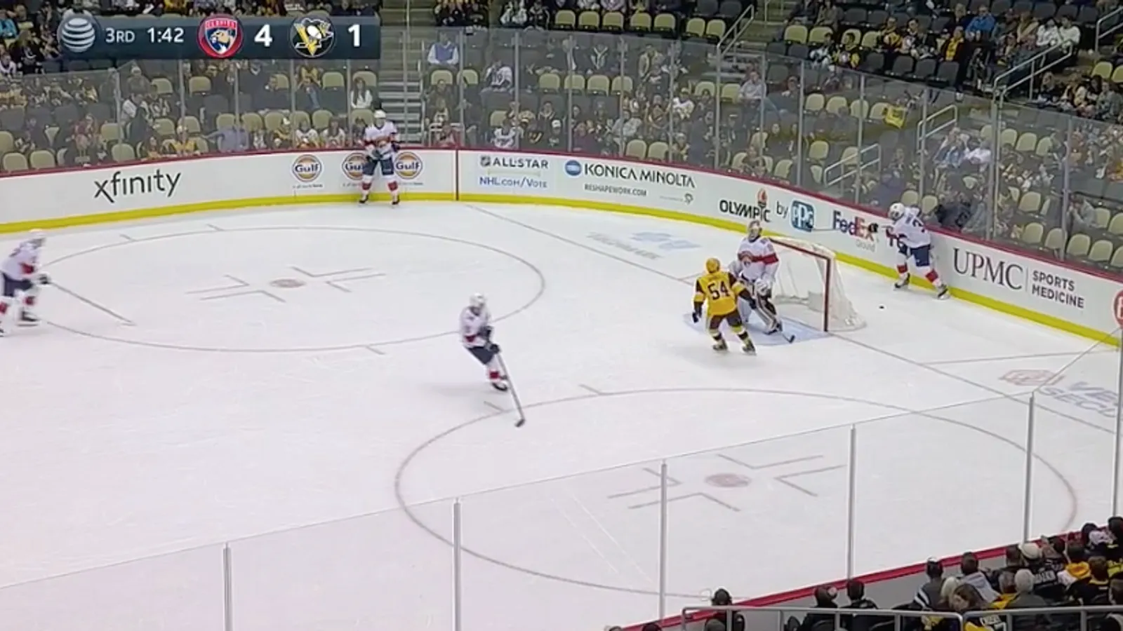 Di Pauli gets 'sonked' by Yandle taken at PPG Paints Arena (Penguins)