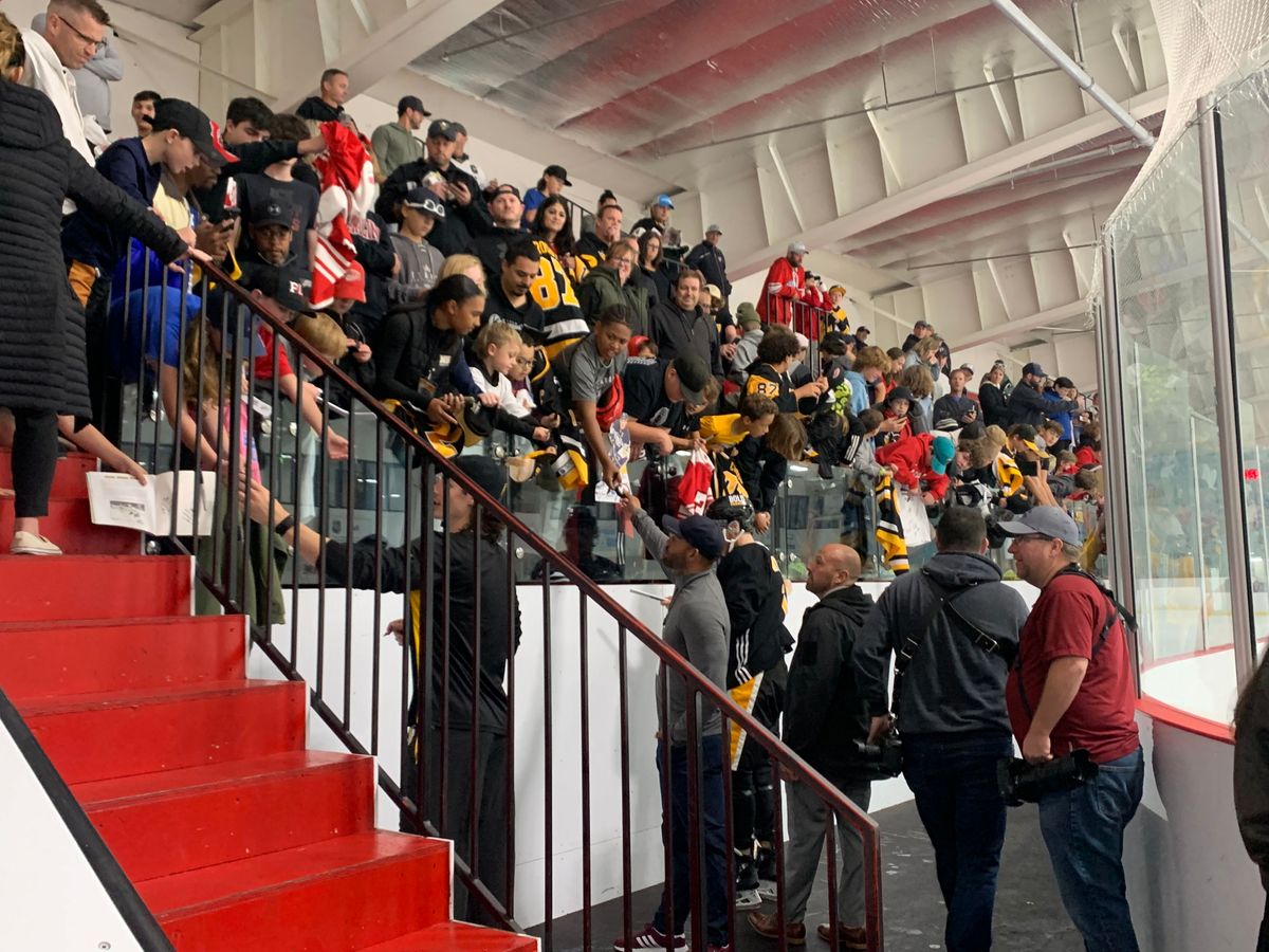 Players sign autographs for fans in Cole Harbour