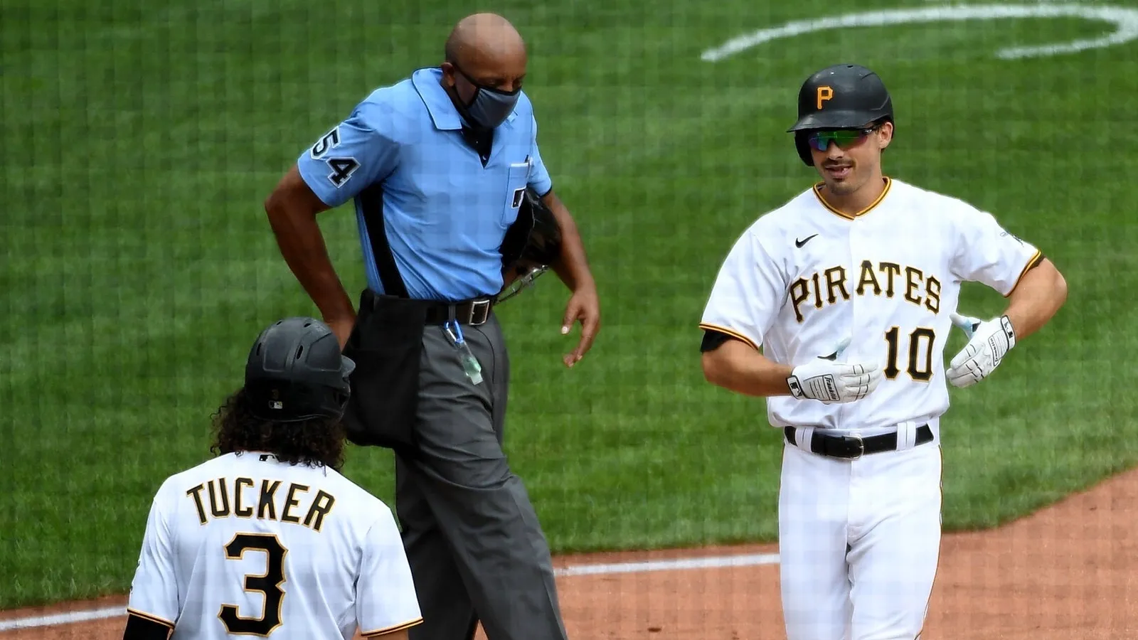 Reynolds shows baby boy how it's done taken at PNC Park  (Pirates). Photo by JUSTIN BERL / GETTY