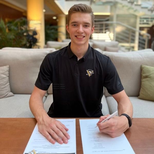 Sergei Murashov signs his entry-level contract on Tuesday.